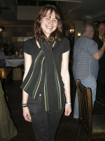 One of the attractive Rose & Crown bar staff modelling a genuine original Ealing Mead school scarf. Photo: Keith Littlejohns.
