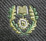 Ken Hattersley’s Ealing Mead County School tie (close up of school emblem). Photo Keith Littlejohns.
